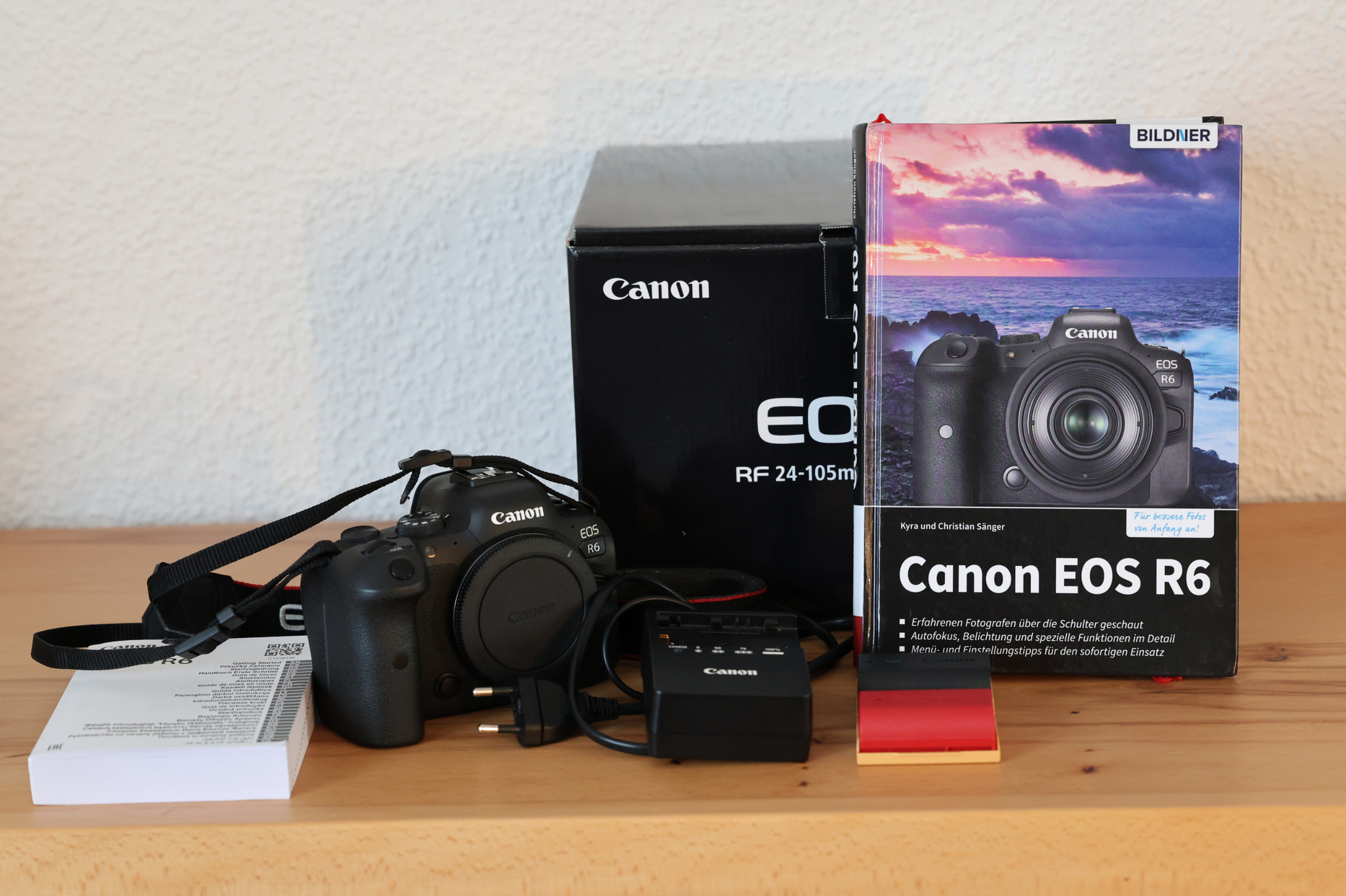 1 R6 mit Buch und Akku.JPG